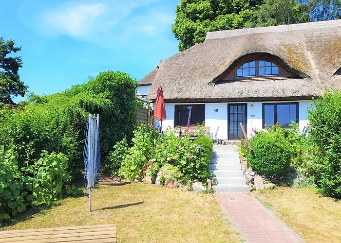 Ferienhaus Mit Reetdach Und Seebli Gross Zicker photo