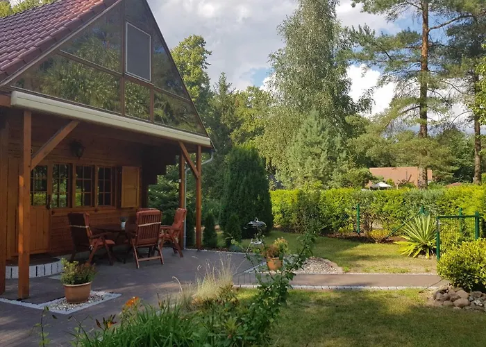 Фото Blockhaus Canow Mit Fahrraedern